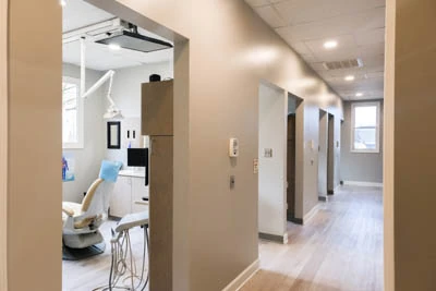 inside look at the hallway leading to the dental exam rooms at Strive Dental Studio