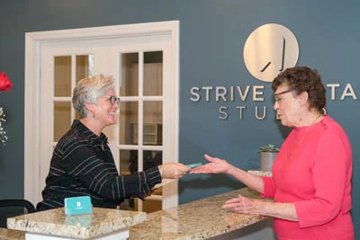 patient scheduling a follow up appointment at Strive Dental Studio